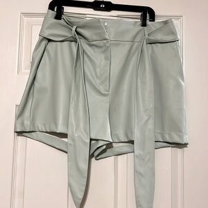 Mint green leather shorts